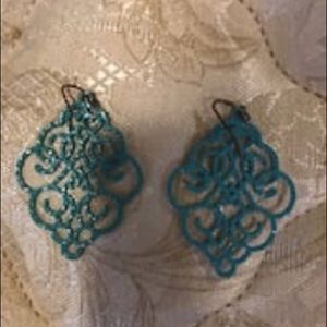 Aqua colored statement earrings